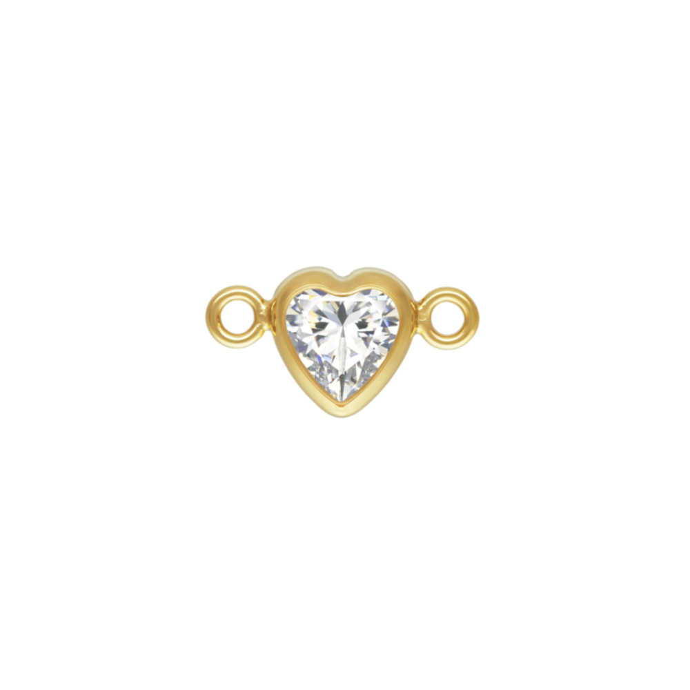 Gold heart-shaped jewelry connector with a clear gemstone on a white background