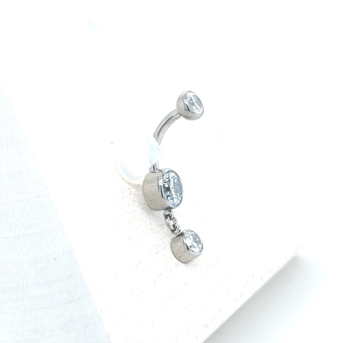 Industrial Strength Titanium White CZ Bezel Dangle Curved Barbell