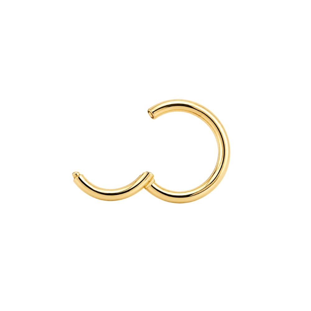 A polished gold-colored metal curved hoop earring with an open end, displayed on a clean white background.