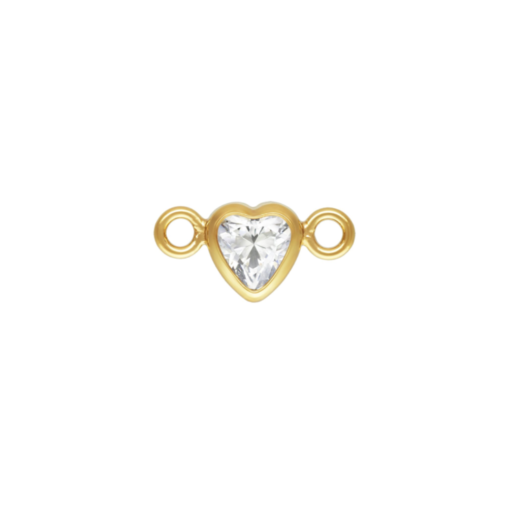 Gold heart-shaped jewelry connector with a clear gemstone on a white background