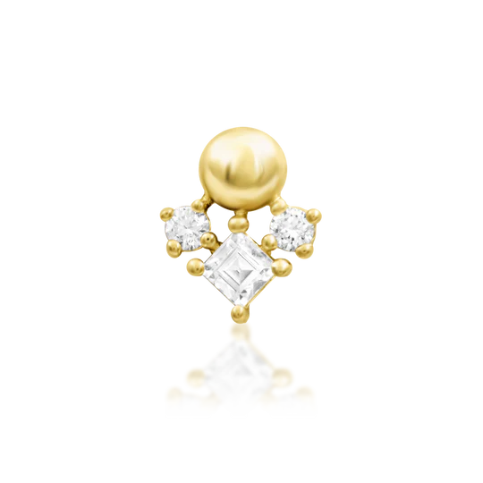 Gold earring with clear gemstones on a white background