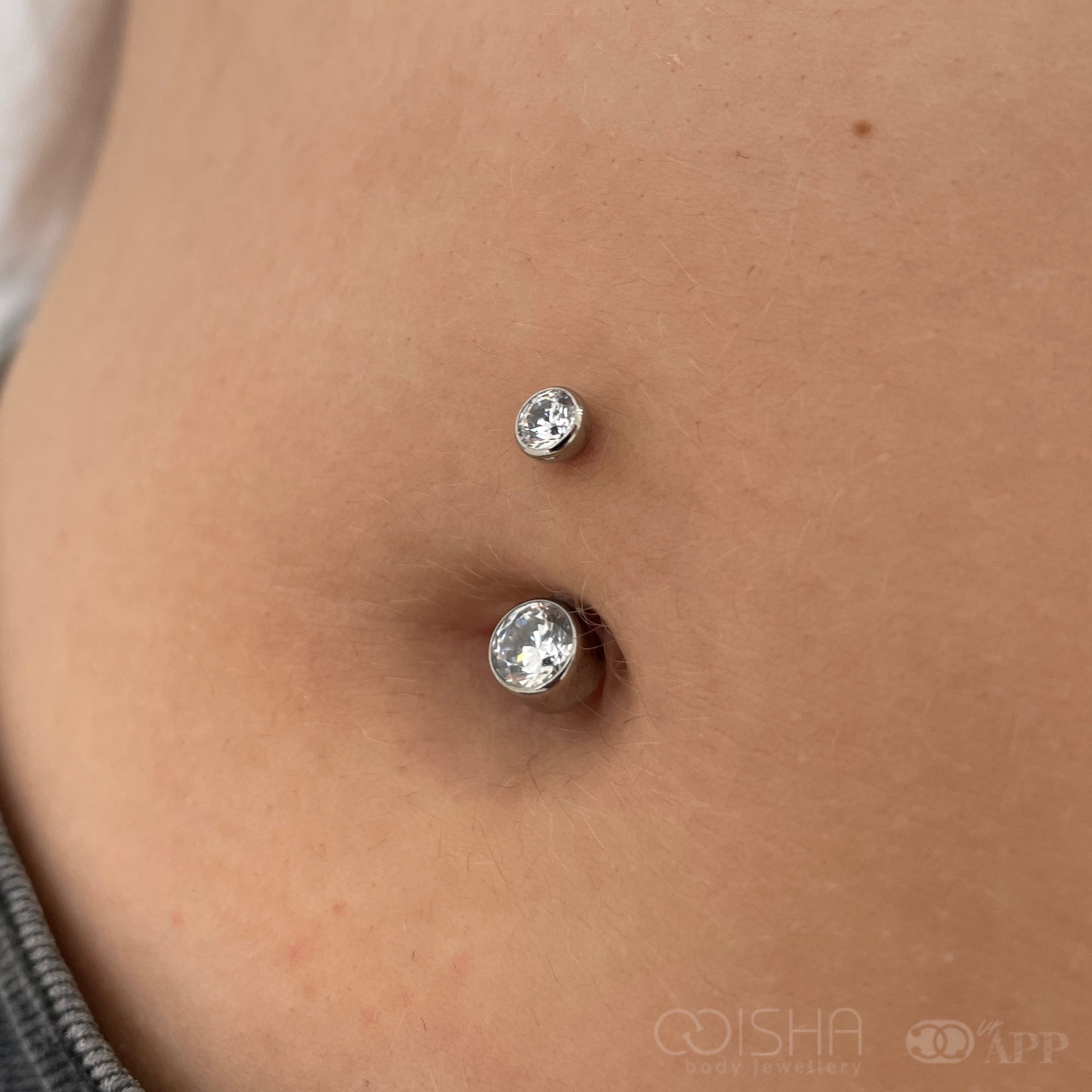 industrial-strength-titanium-bezel-cz-curved-navel-barbell-isha-body-jewellery
